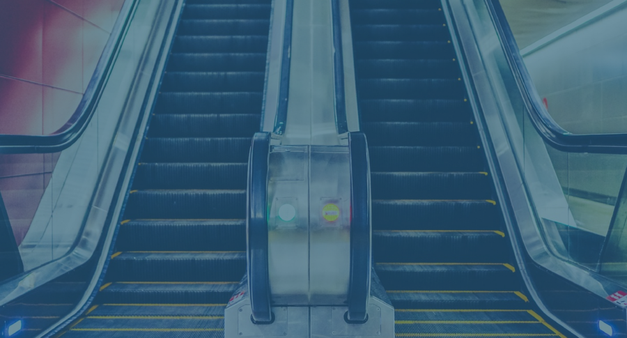 Painting of escalator with blue overlay